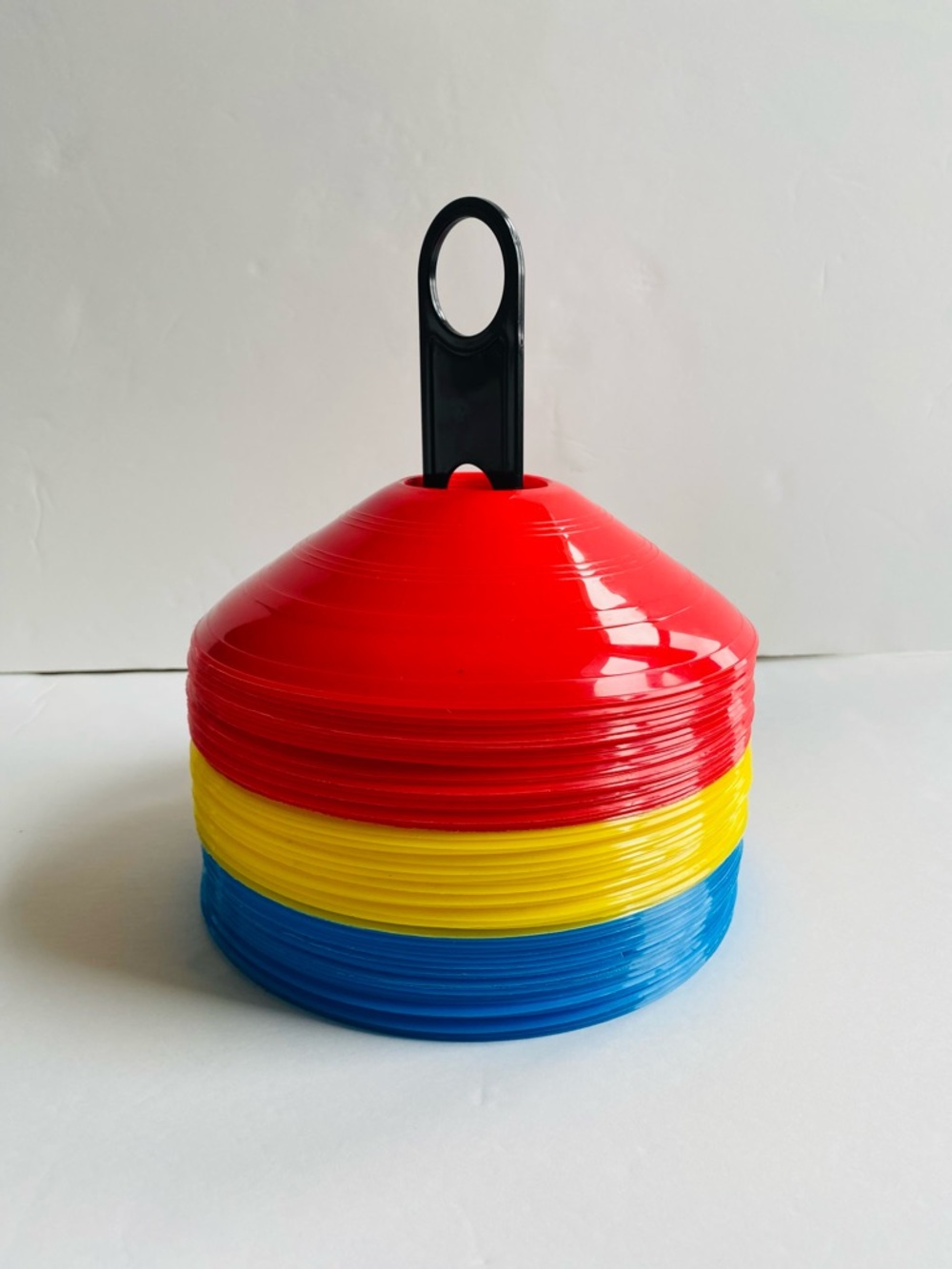 Soccer Cones (like New). 8 red + 4 green used pinnies (fair condition)